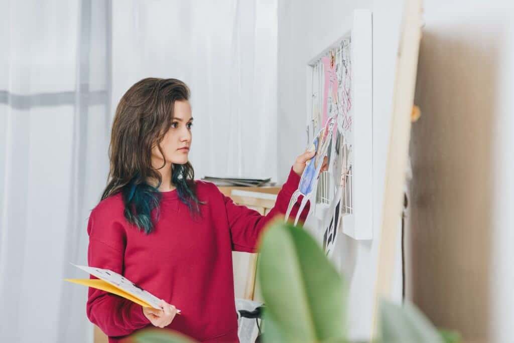 Young woman creating mood board