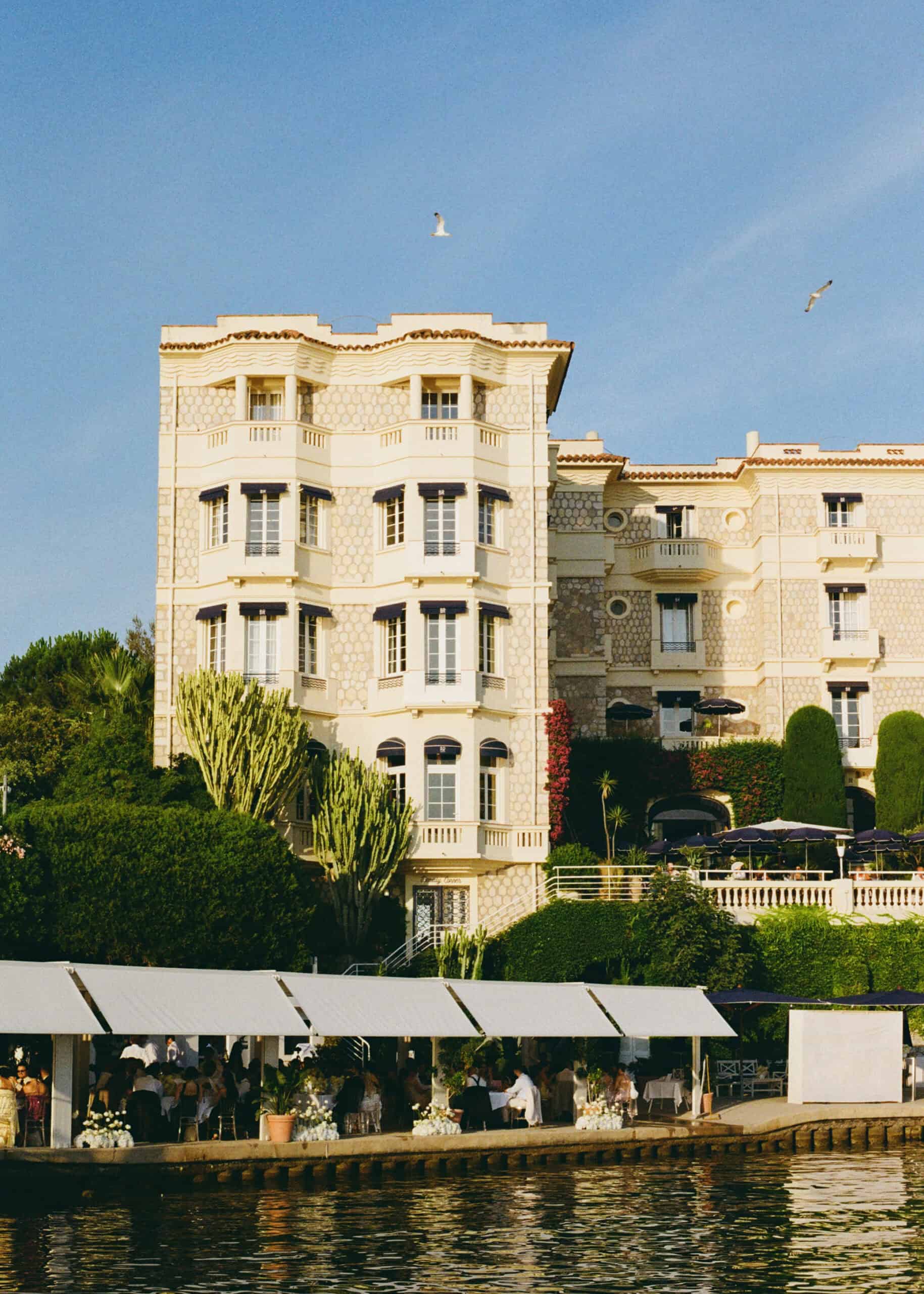 Seafront exterior of Hôtel Belles Rives in Juan-les-Pins on the French Riviera.